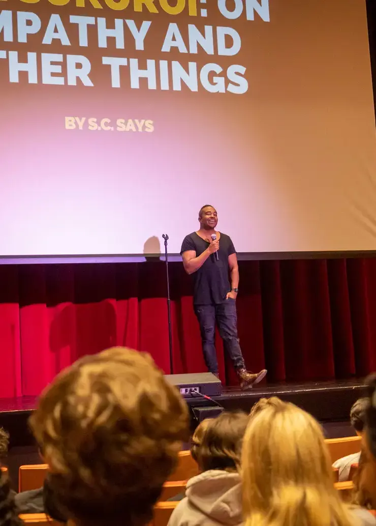 Author presenting to students