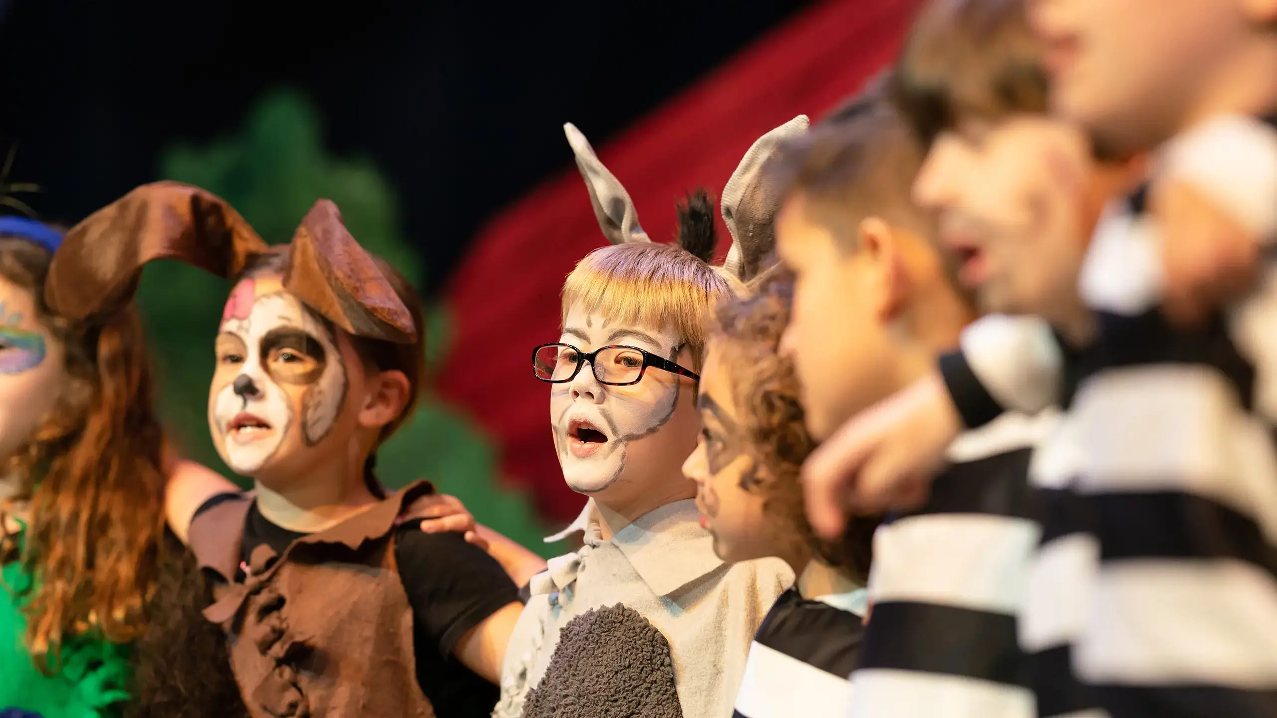 Students in costume in a play