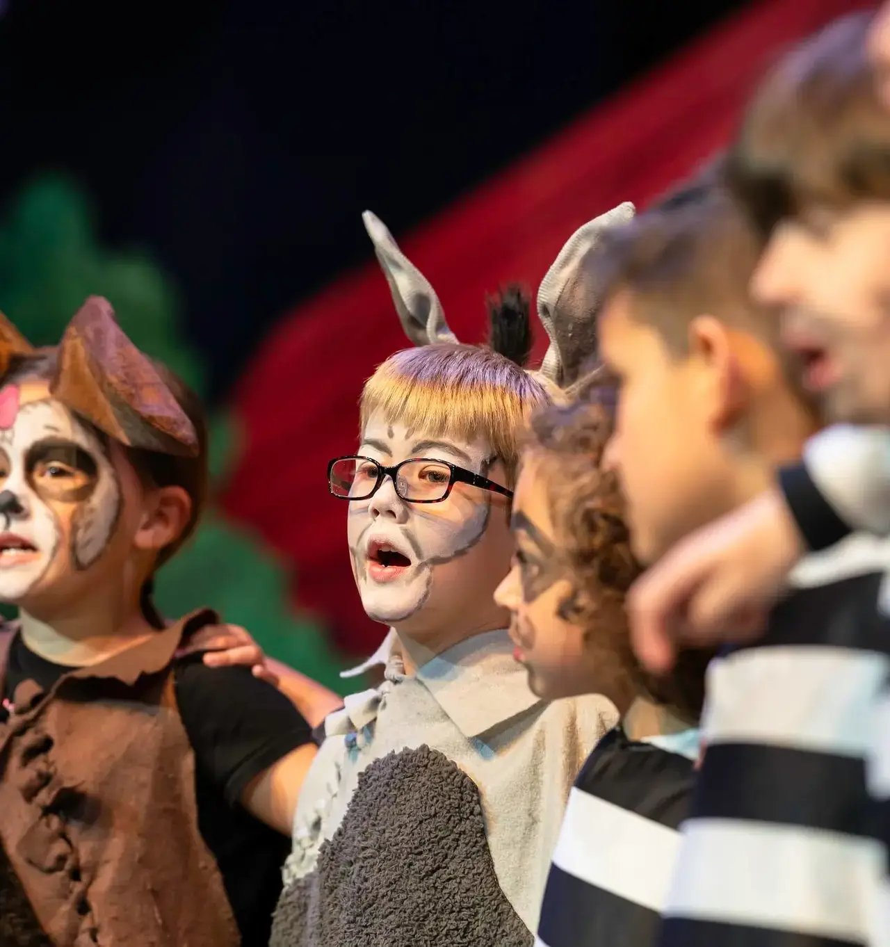 Students in costume in a play