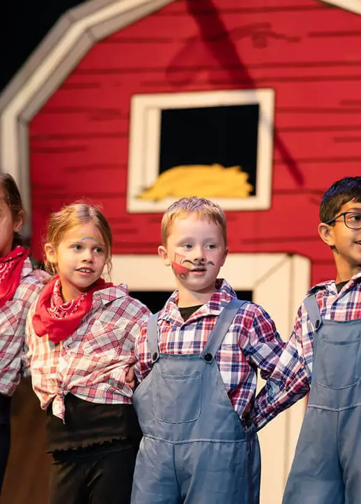 Students dressed in costume for play